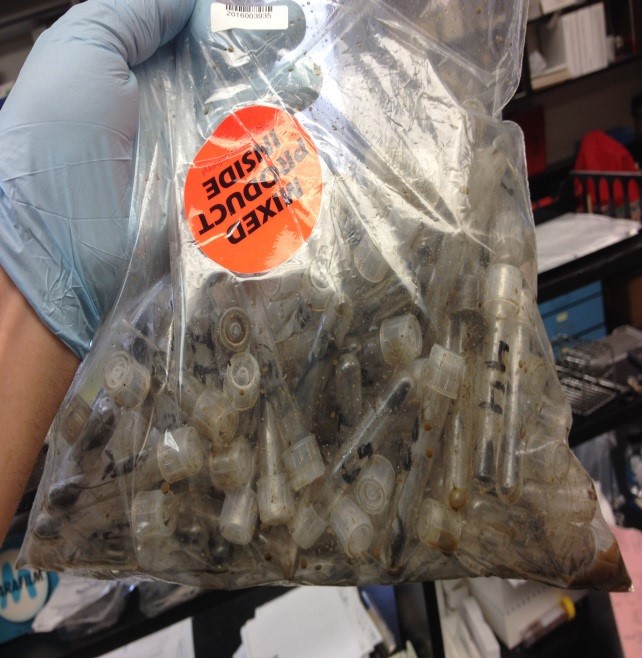 Photo showing samples that leaked inside a bag because the cap on the tubes were not secure.