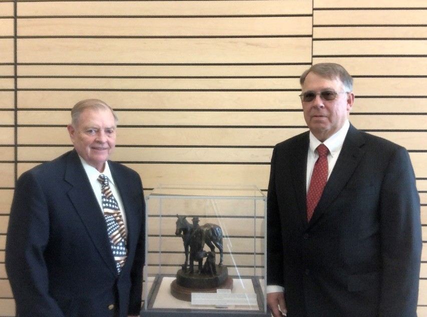 Pictured are Dr. Alan Doster (right) and Dr. James Langley, representative of the NVMA Centennial Scholarship Foundation