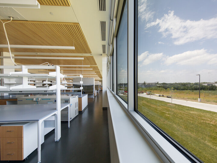 An NVDC lab with a row of windows along the right showing the view of a sidewalk and grass.