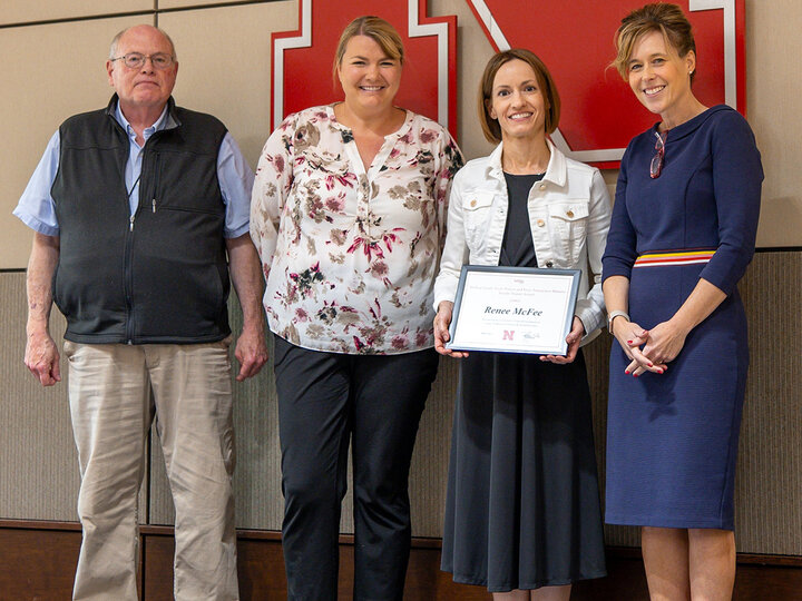 Lined up in front of a red "N", from left to right, are Dr. Scott Mcvey, Dr. Amy Desaulniers, Dr. Renee McFee and Interim IANR Vice Chancellor Dr. Tiffany Heng-Moss.